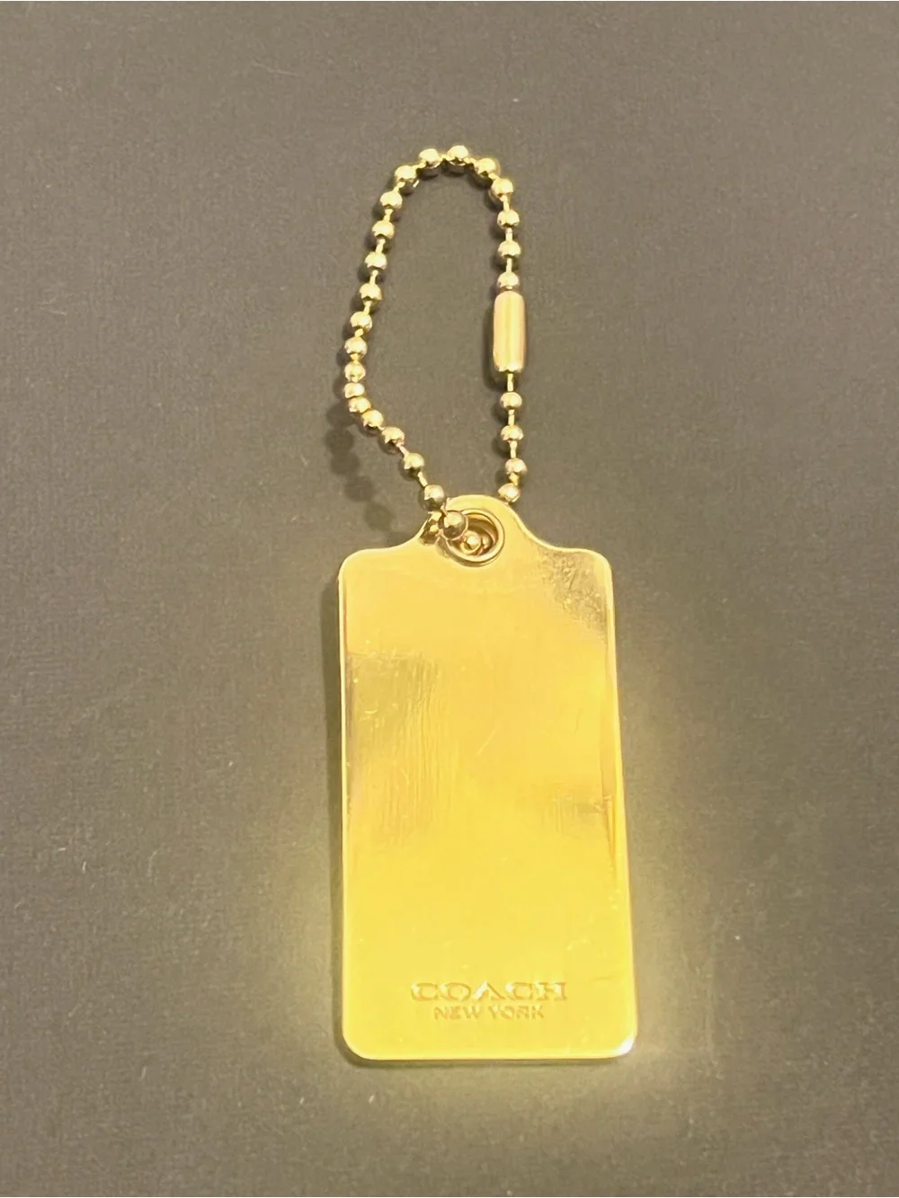 Rare Vintage Coach Gold Tone Embossed Horse & Carriage Dog-Tag Key Holder